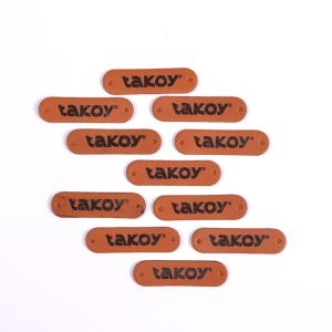 Kunstleer labels logo Takoy - set 10 stuks